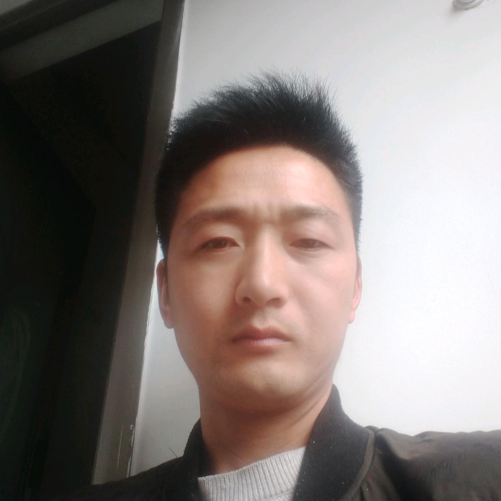 罗