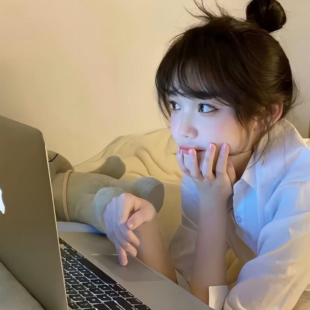 張..
