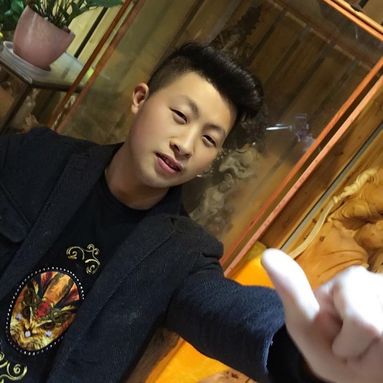 鑫泽木雕艺术黄涛