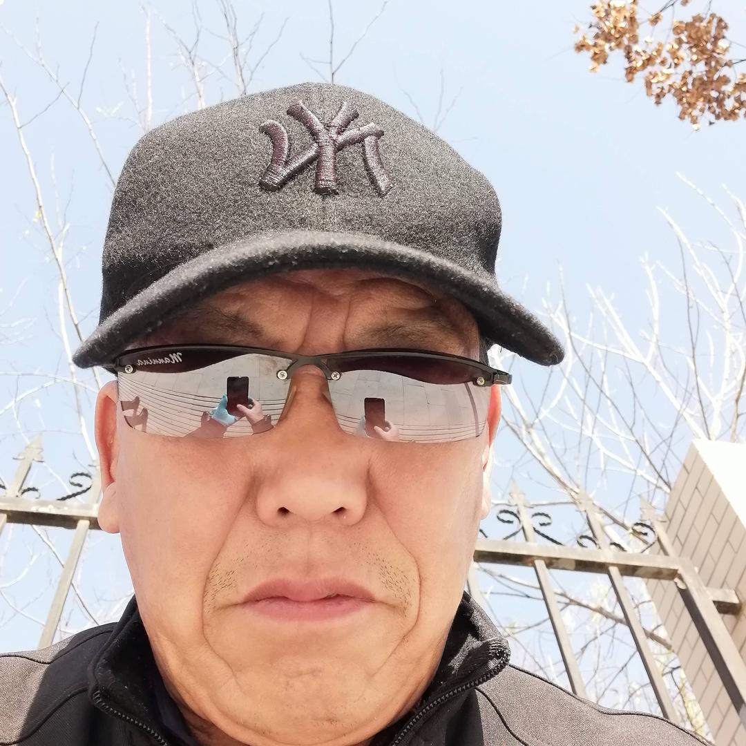 老张