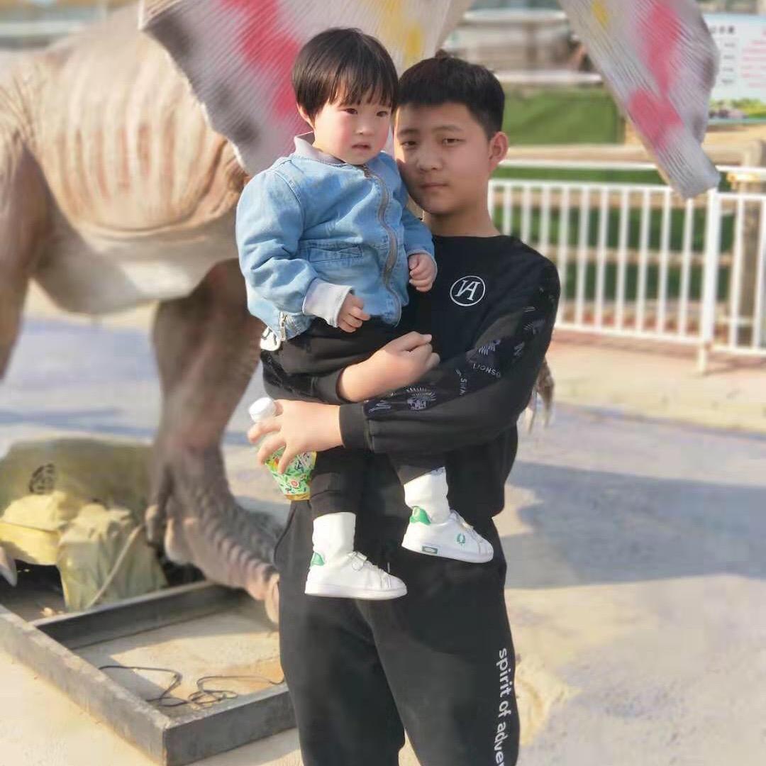 辉@