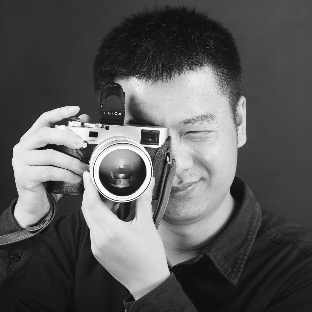 爱摄影的丘比特