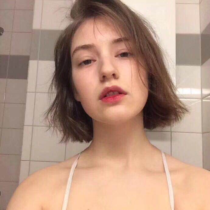 J.