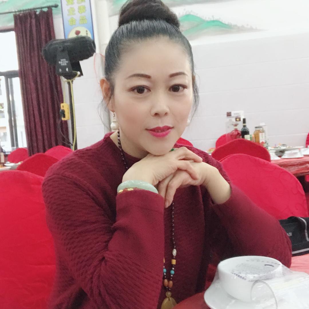 建梅 吴兴华美服装店