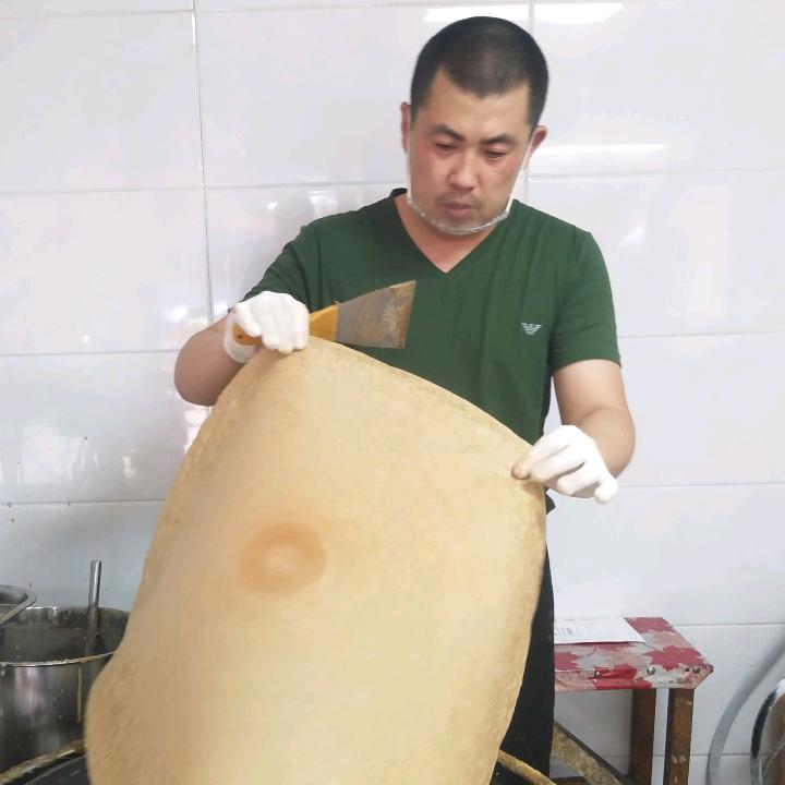 桦甸市明桦街憨老磨煎饼店