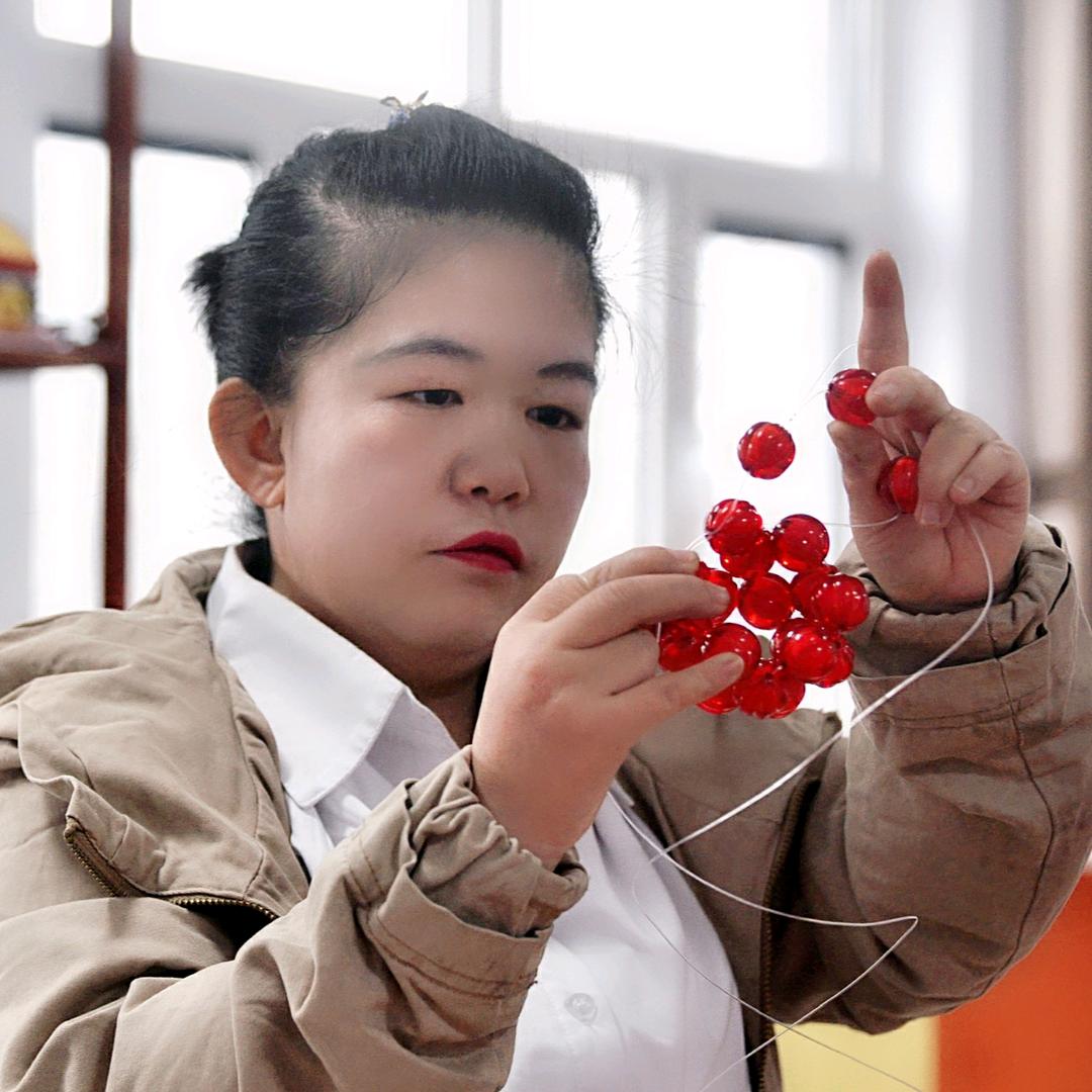 新莹珠绣串珠手工坊