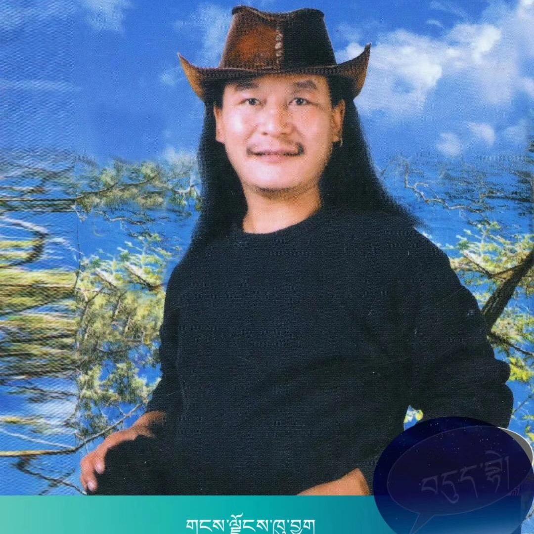 尕周