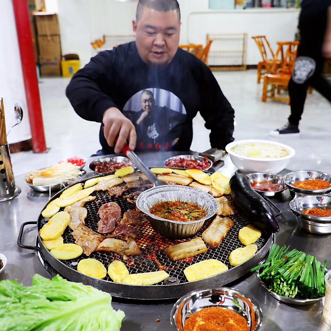 大凉山烤肉刨汤店