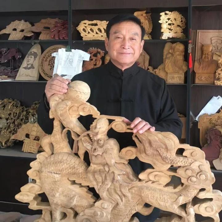 阳谷木雕王传成