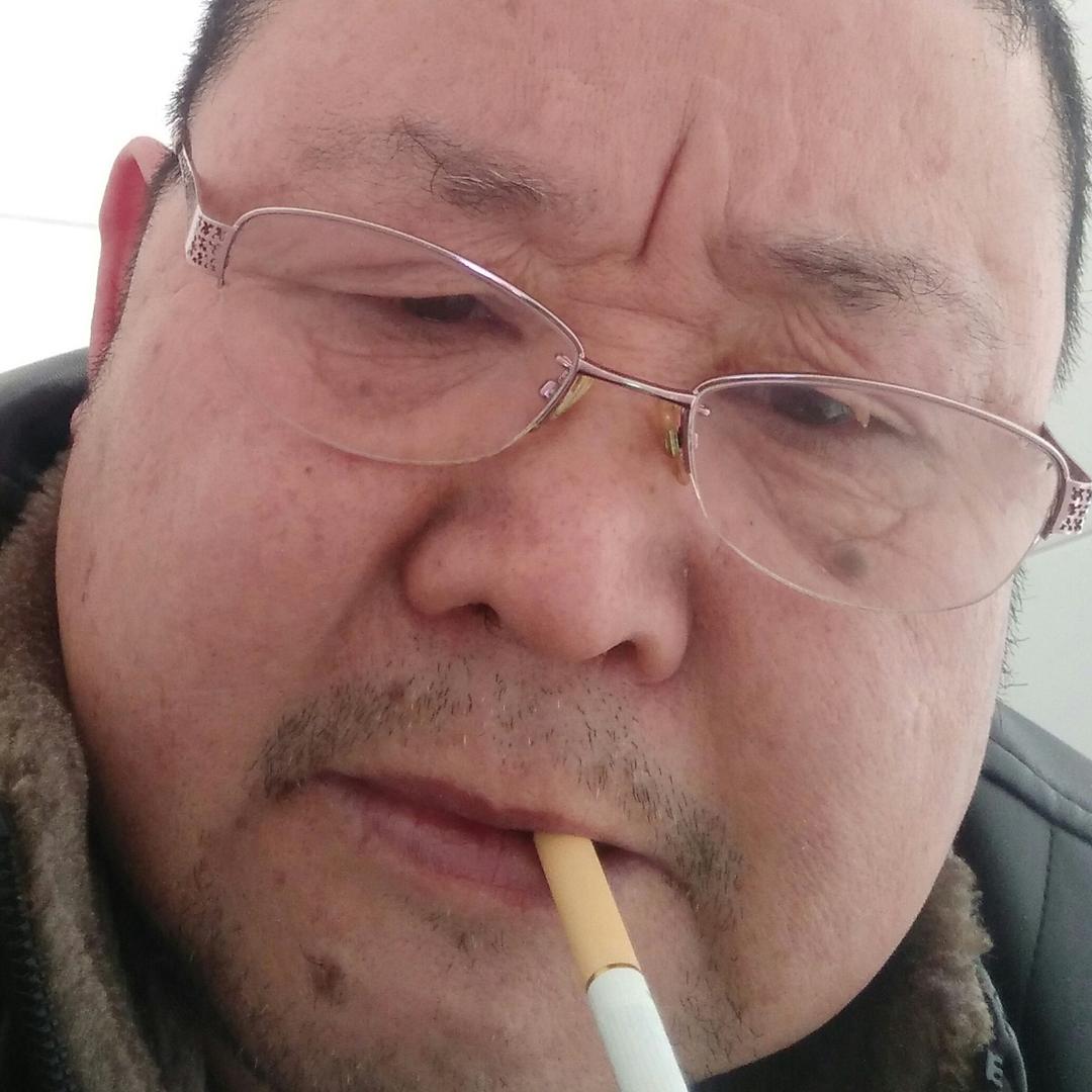 老张。