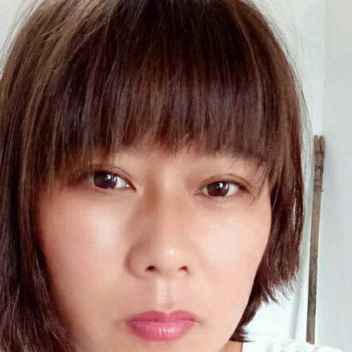 劉