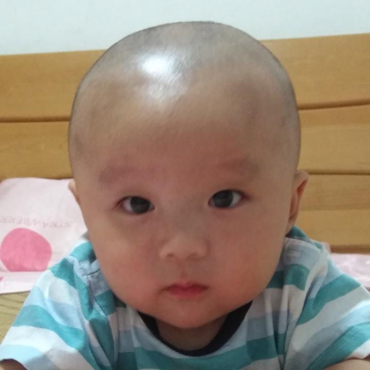 坦然一笑