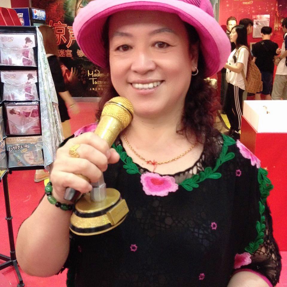 二梅女士