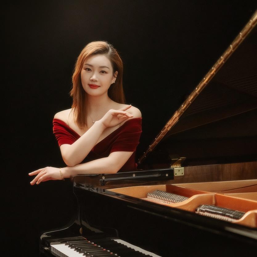 黄石教唱歌弹琴  李老师