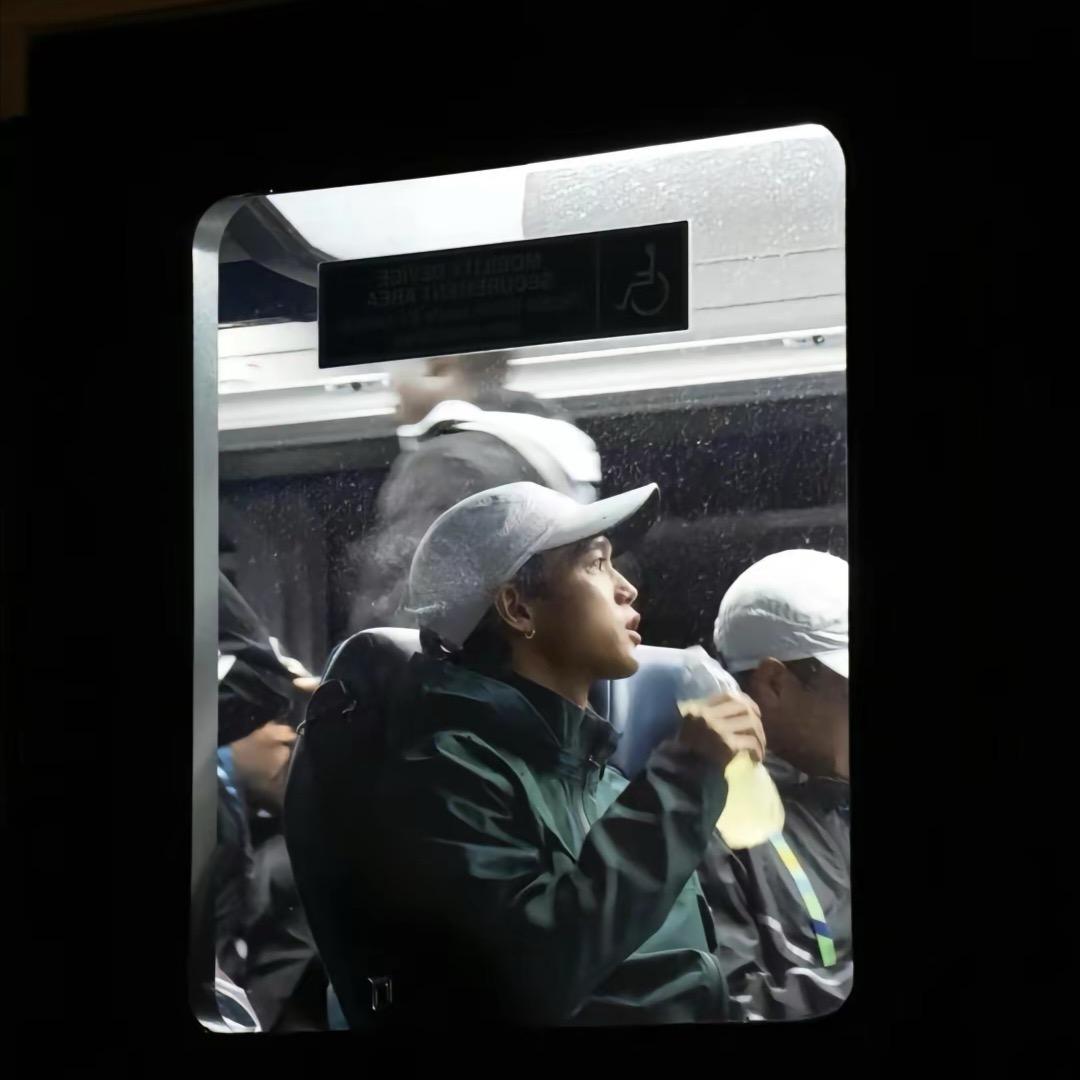 J.