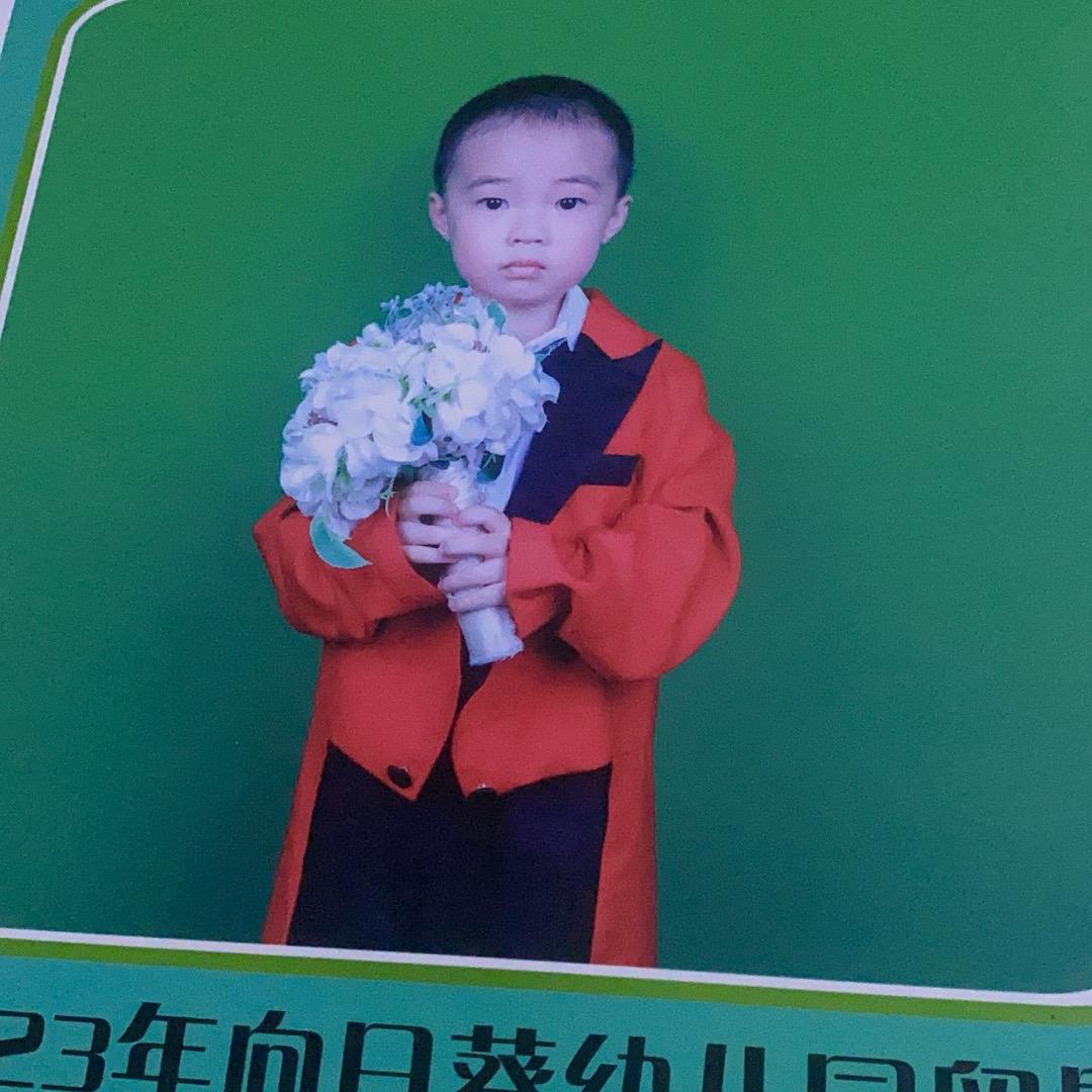 光哥“覃叔”