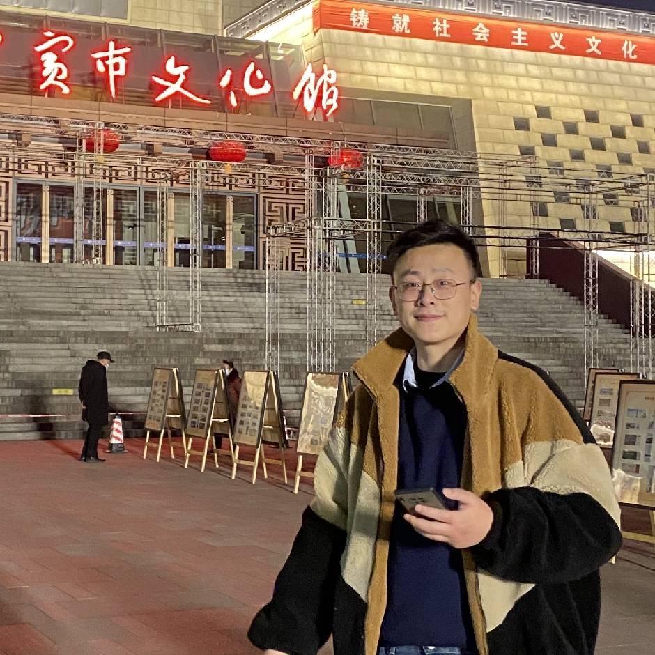 老张