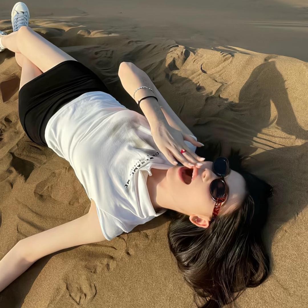 朱小美.