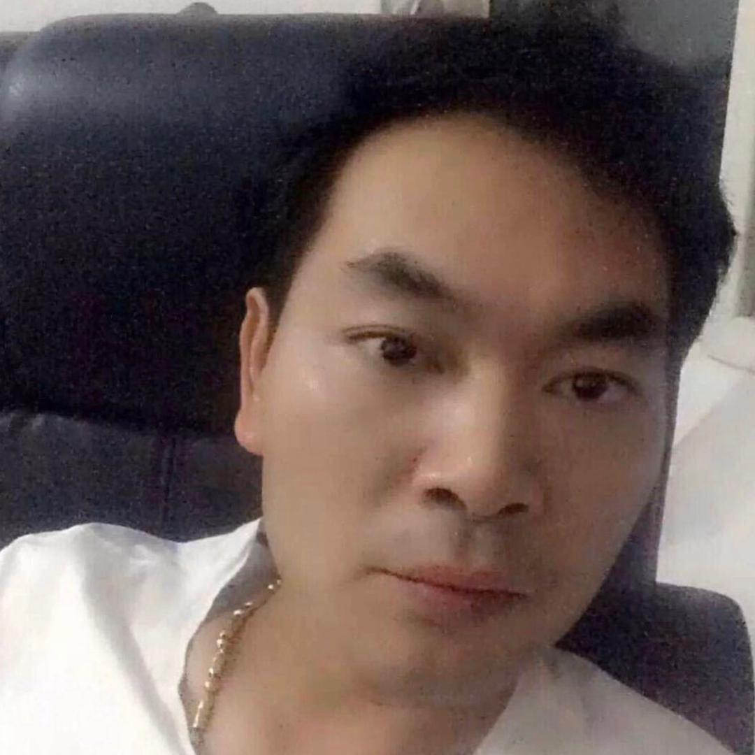 黄明彦
