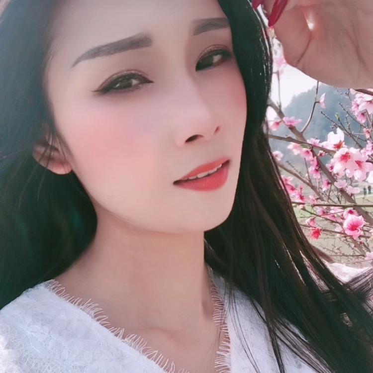 嫣然