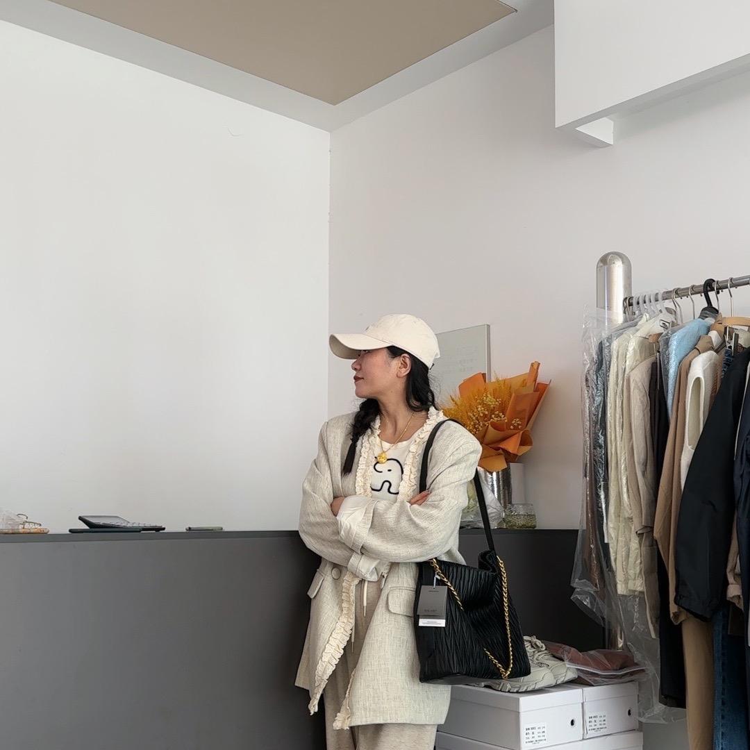 汶上县山茶杭派女装店