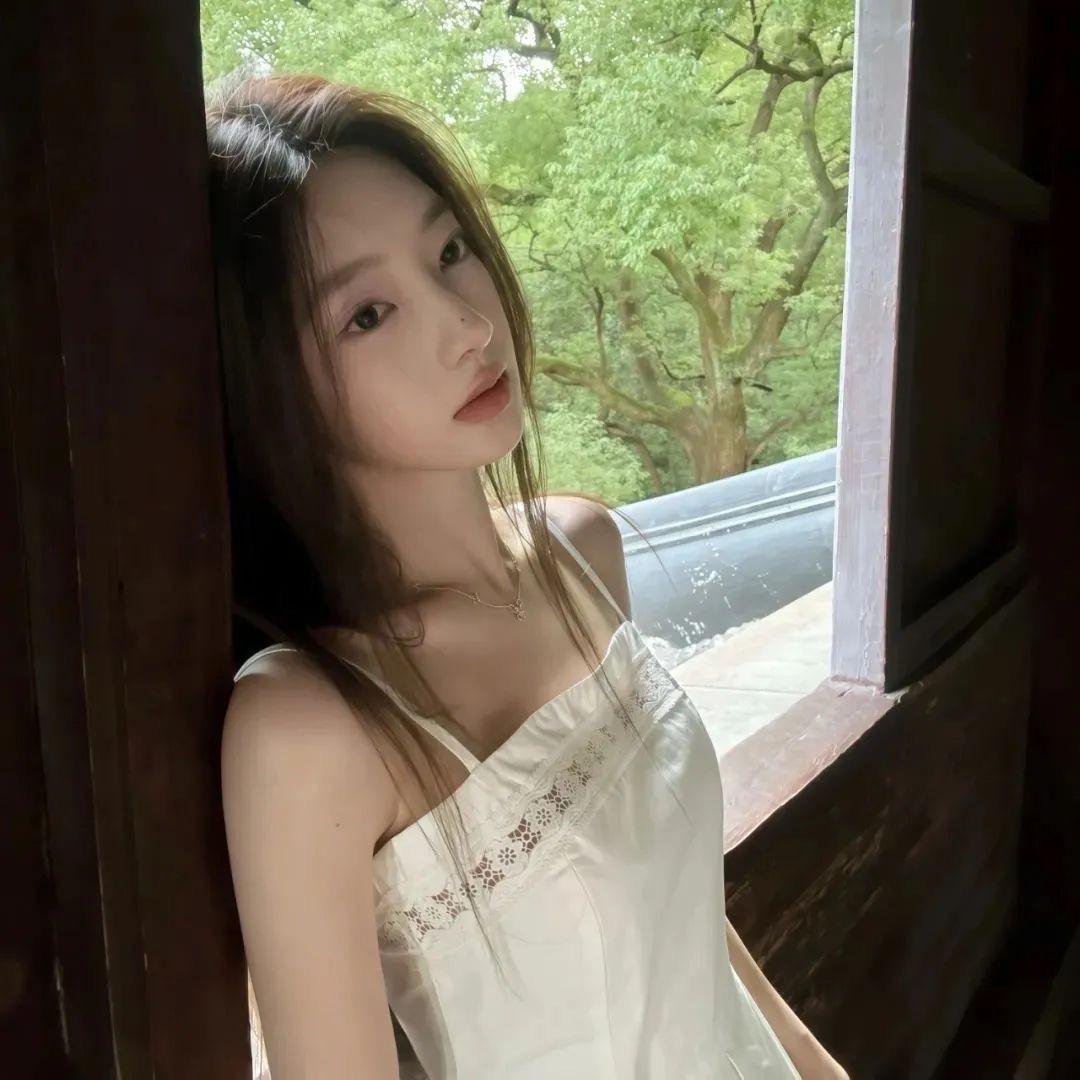 小井.