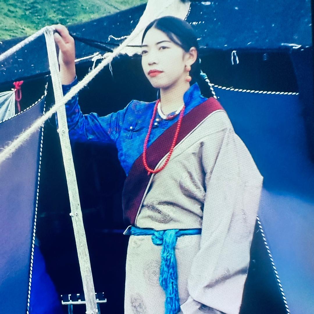 唐。