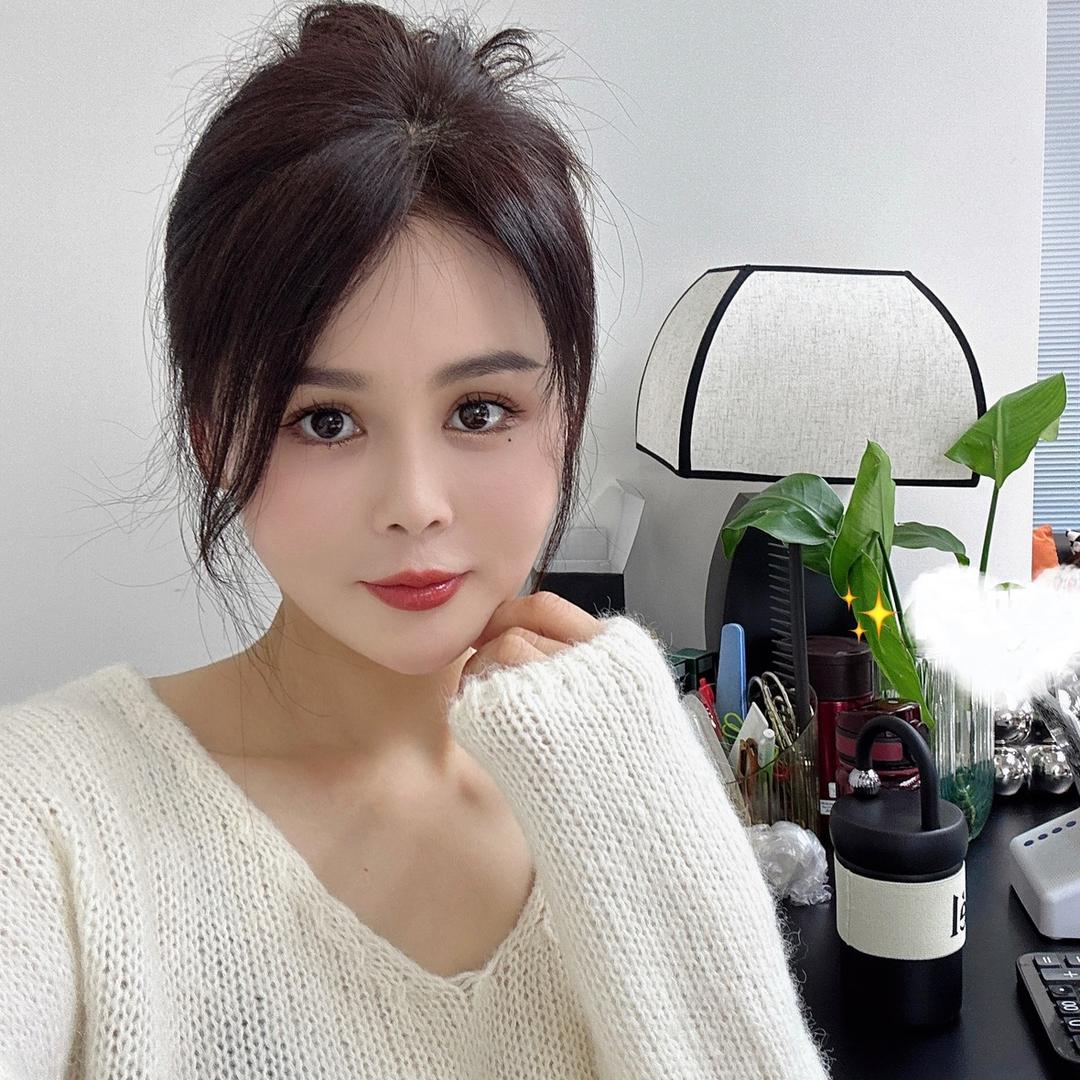 伊媚女装