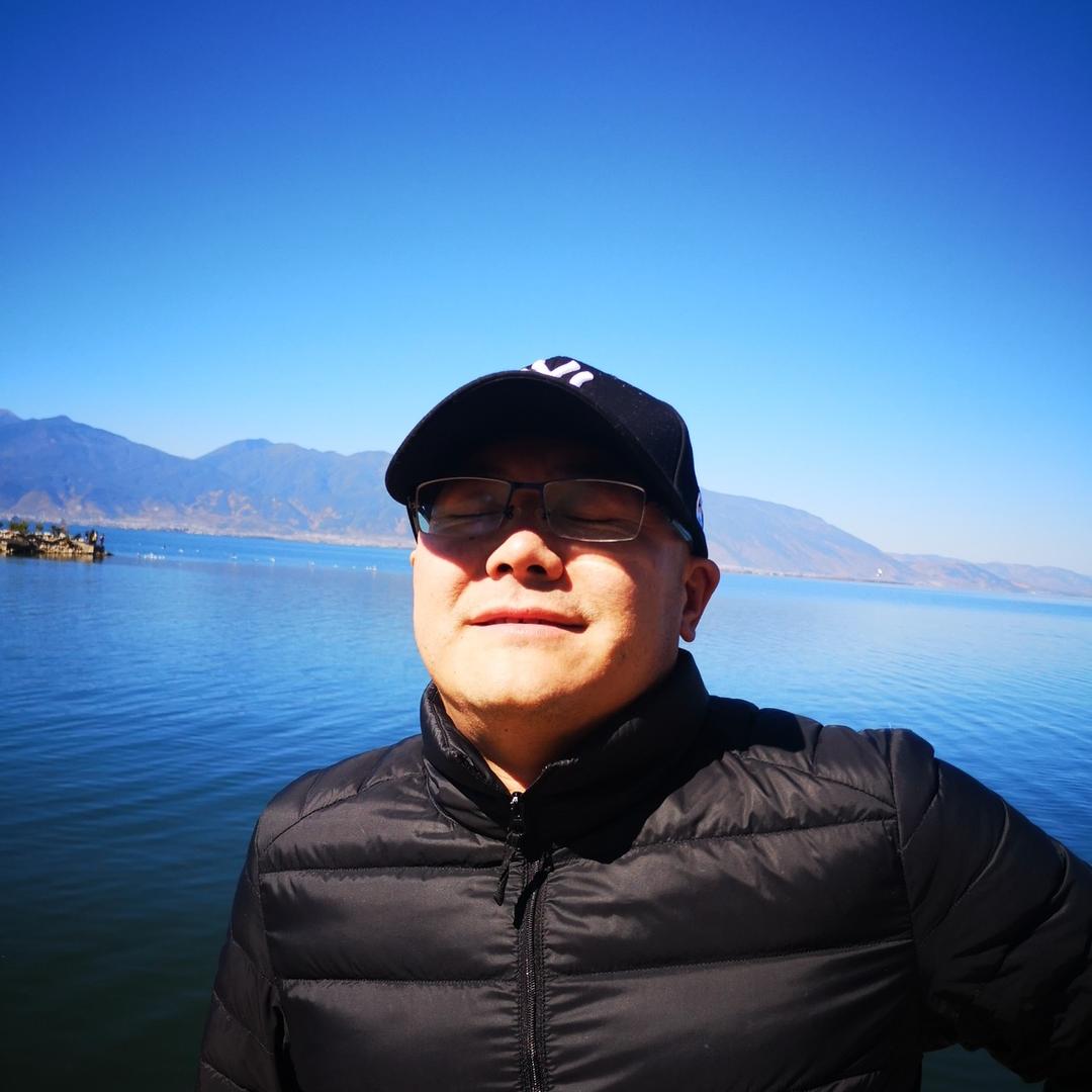 玩特斯拉的老唐