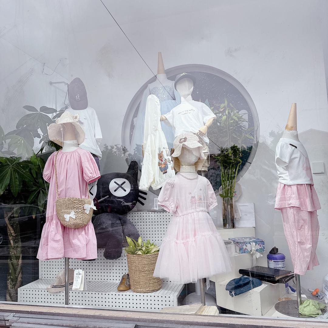 顺平县精灵玛可童装