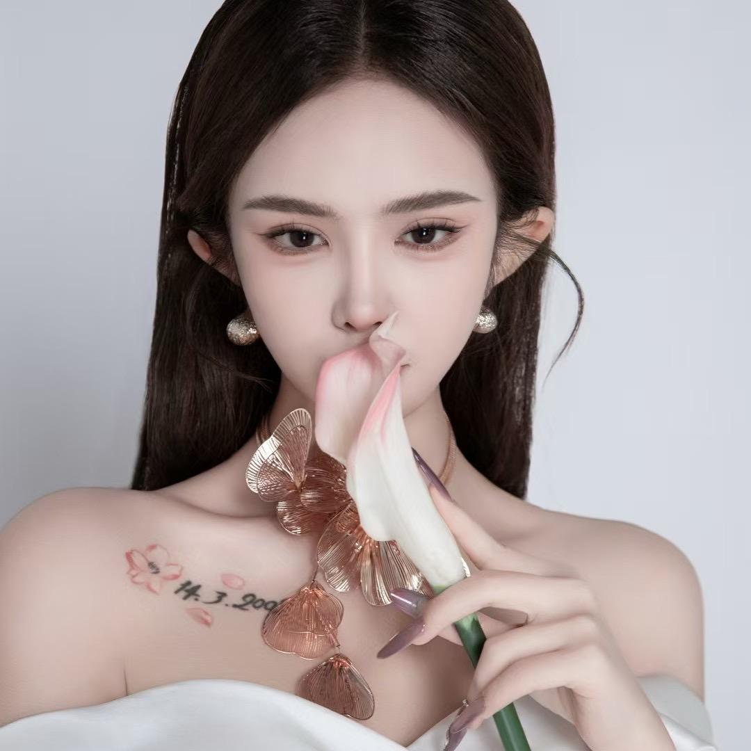 佳念^