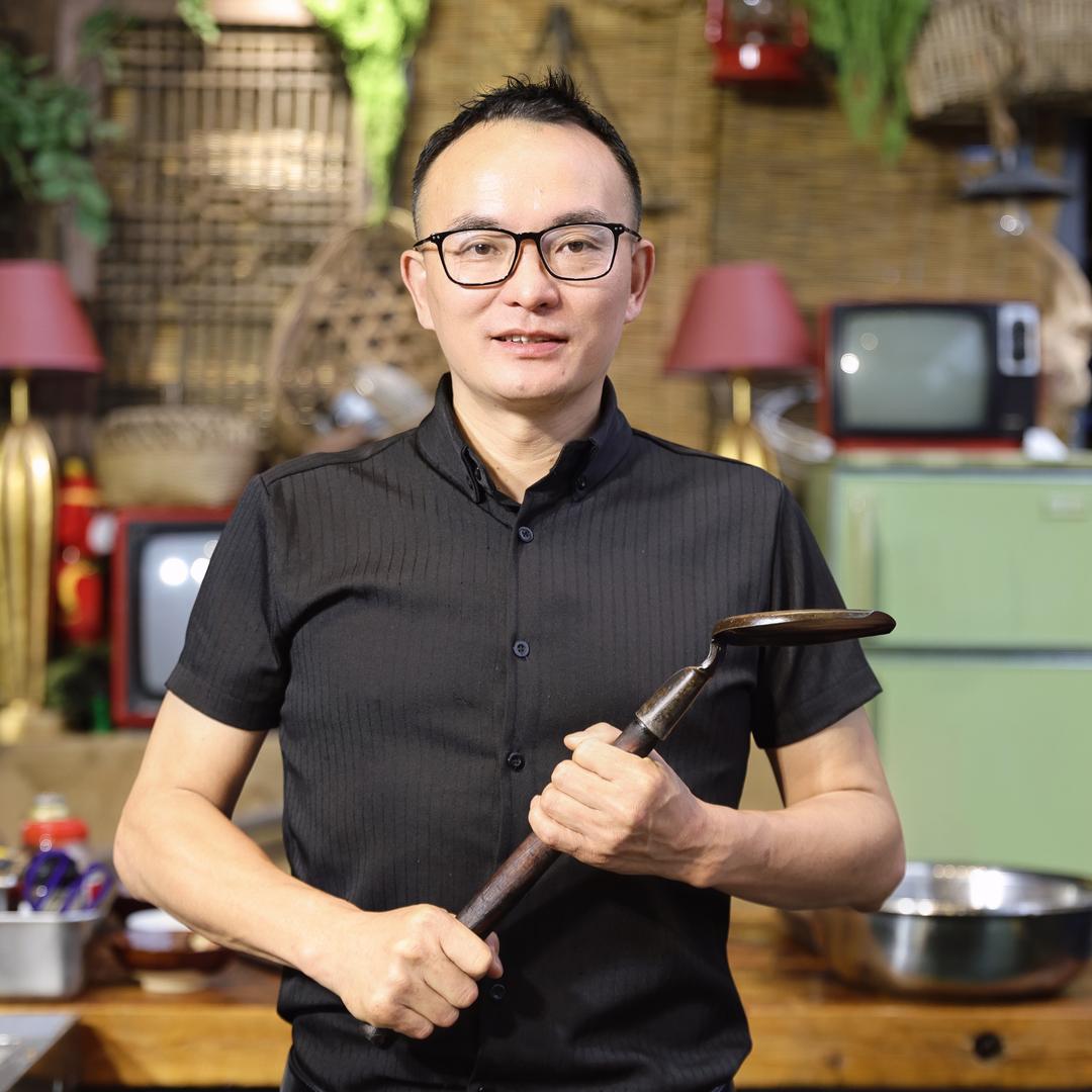 做重庆菜的周勇