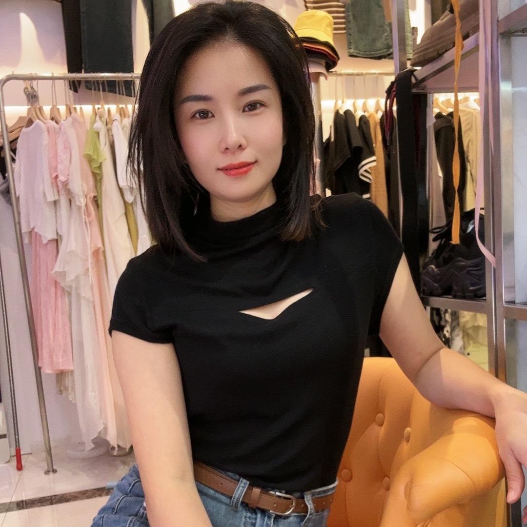 佐帝男装老板娘