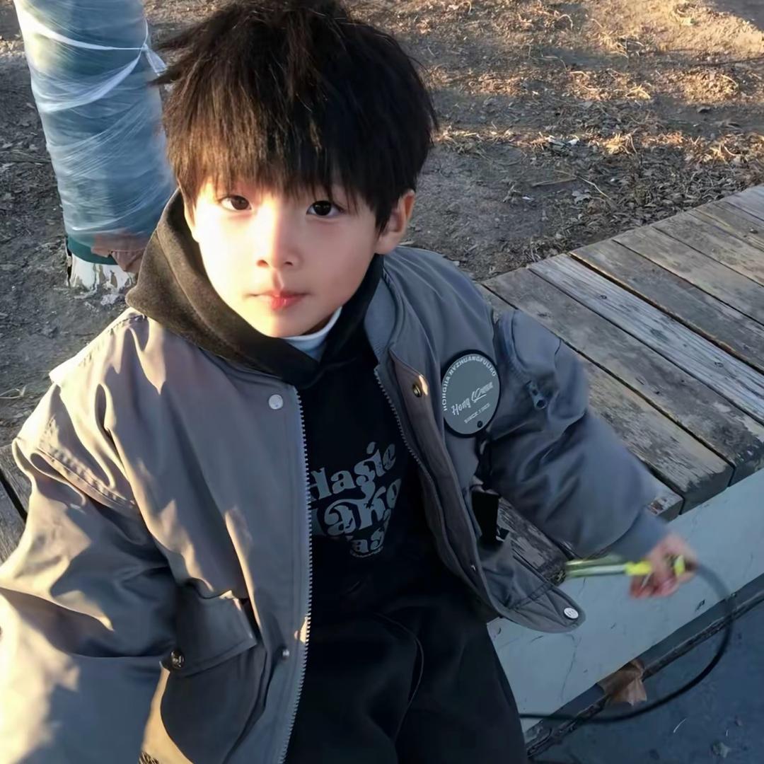 J.