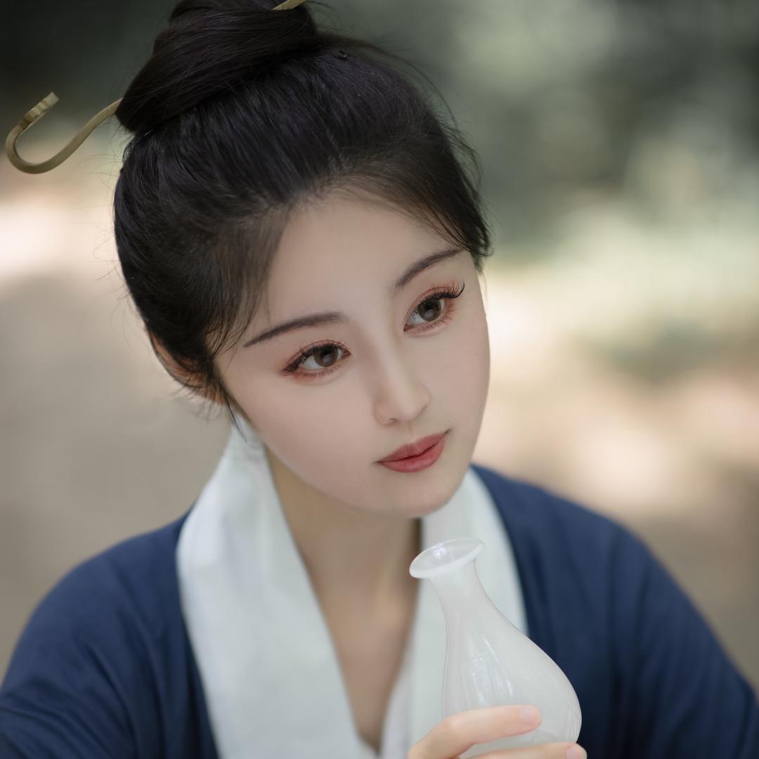 葛三卿