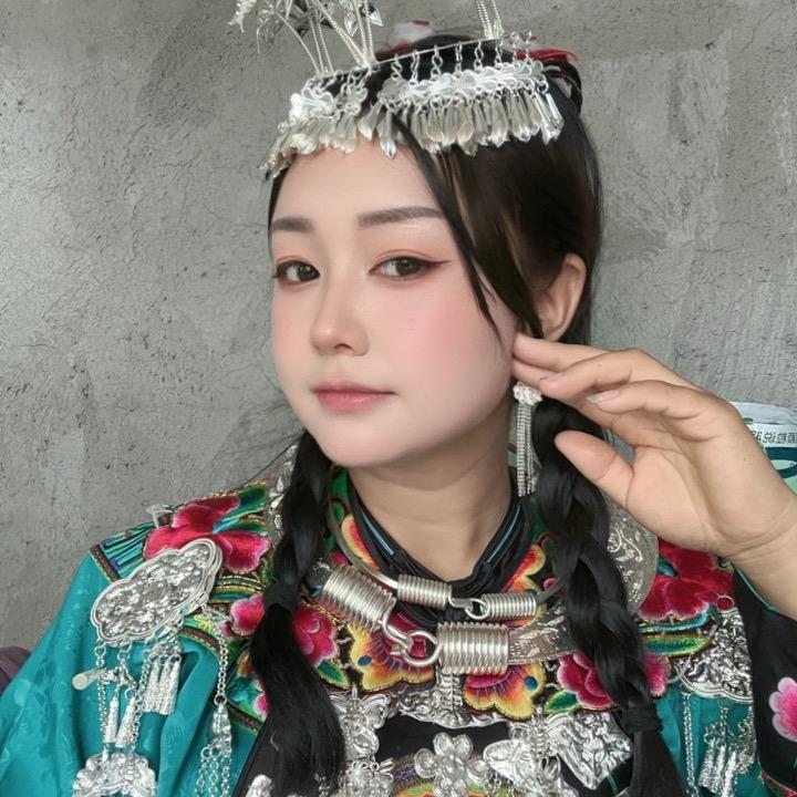（苗家三妹）