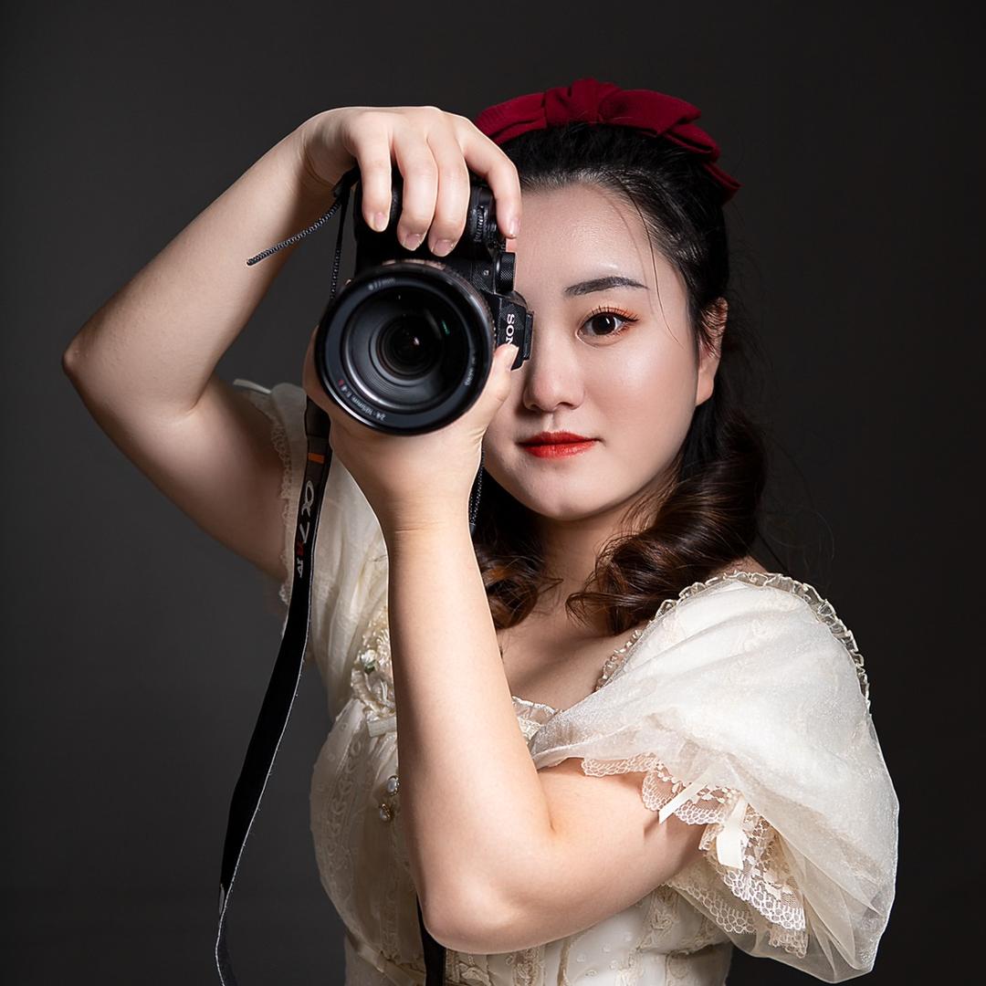 摄影师-小绯