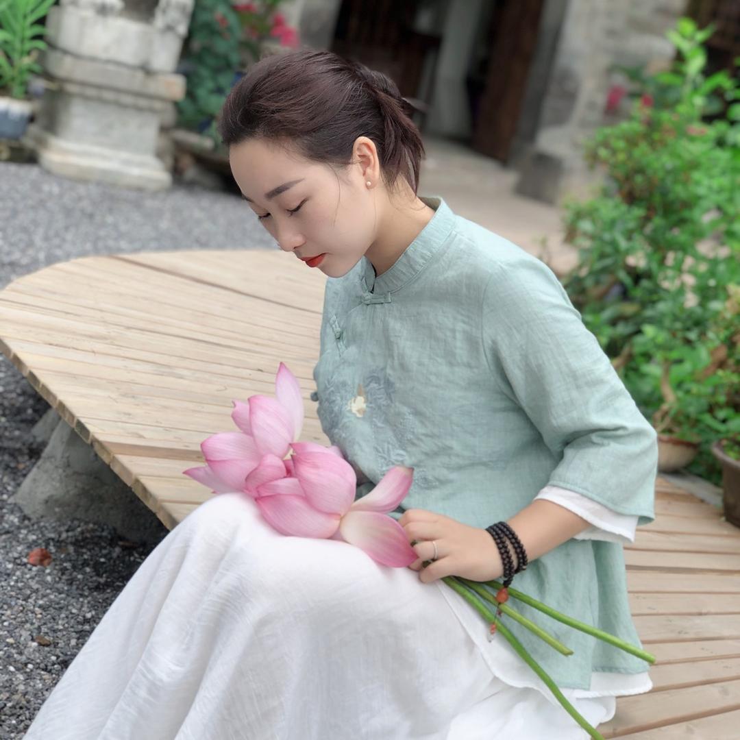 李温柔.