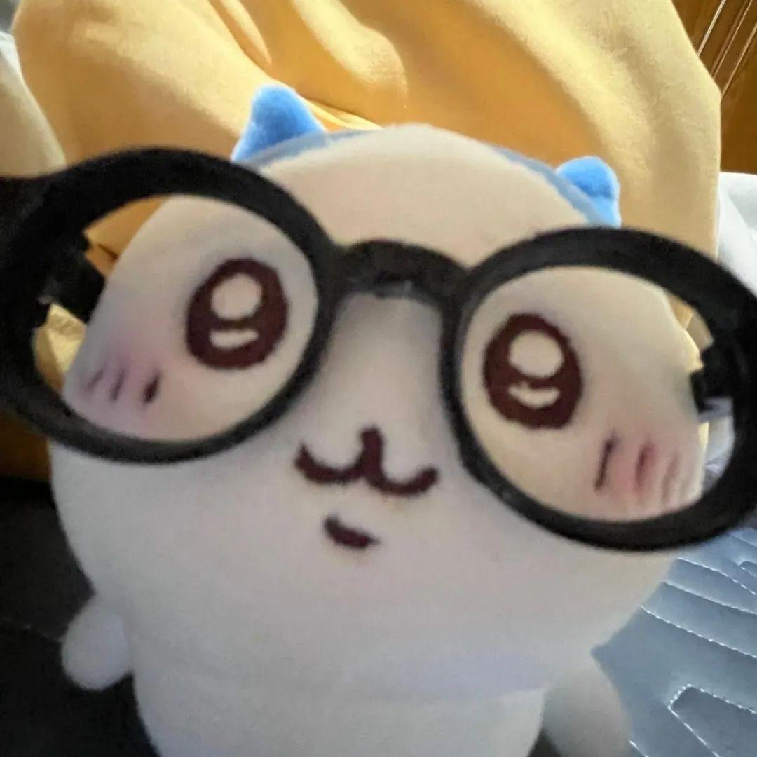 7702