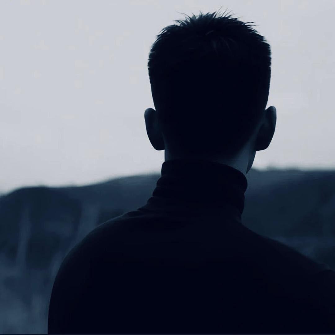M.