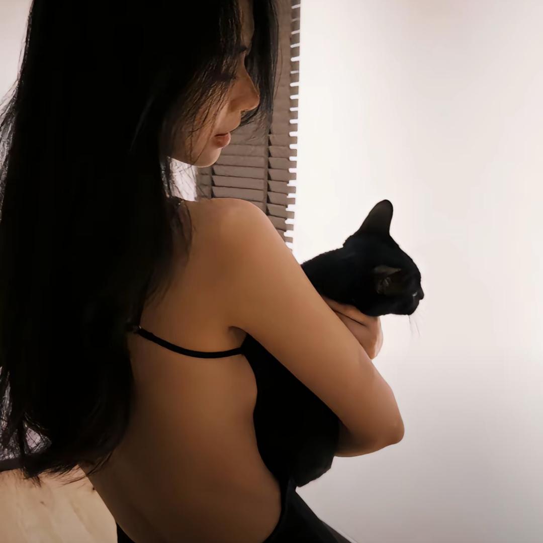 77-.