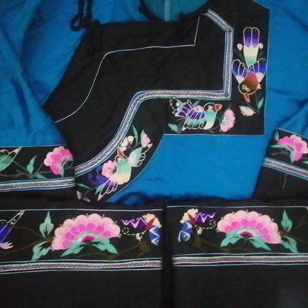 七月绣花的头像