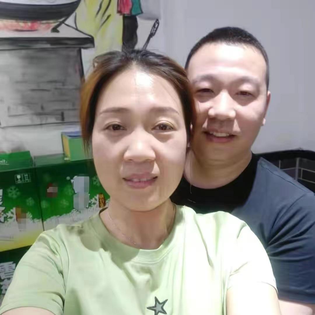 小井夫妇