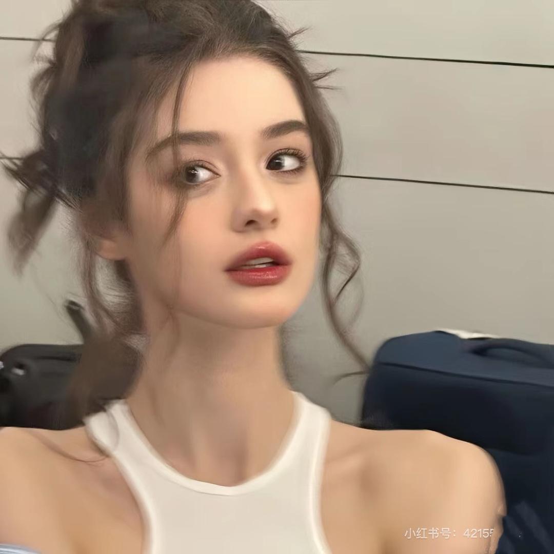 柒怡.