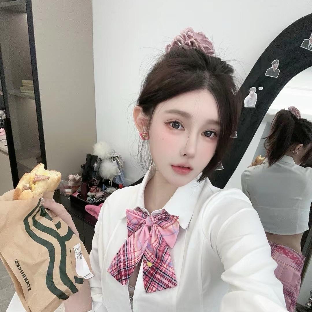 梁梓琪.