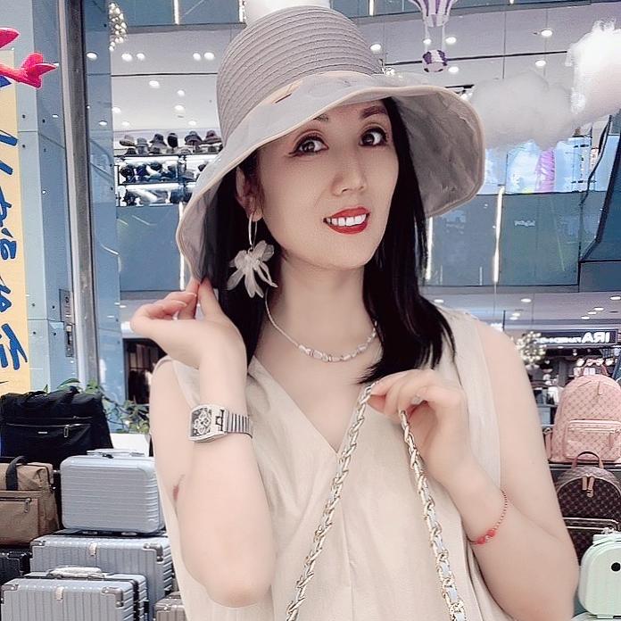 稻草人箱包皮具丽姐