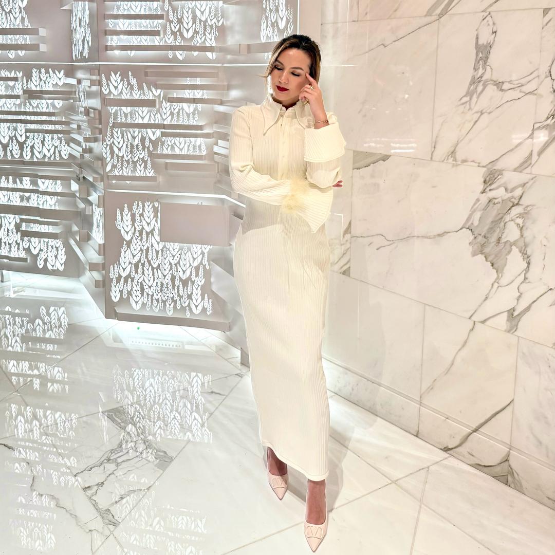 天山区中湾街木巴拉克服装店