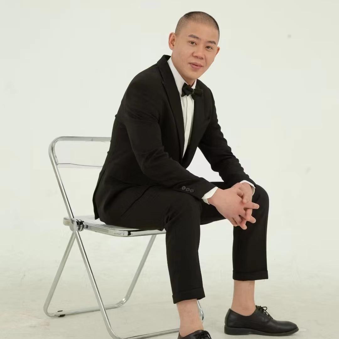 陈。