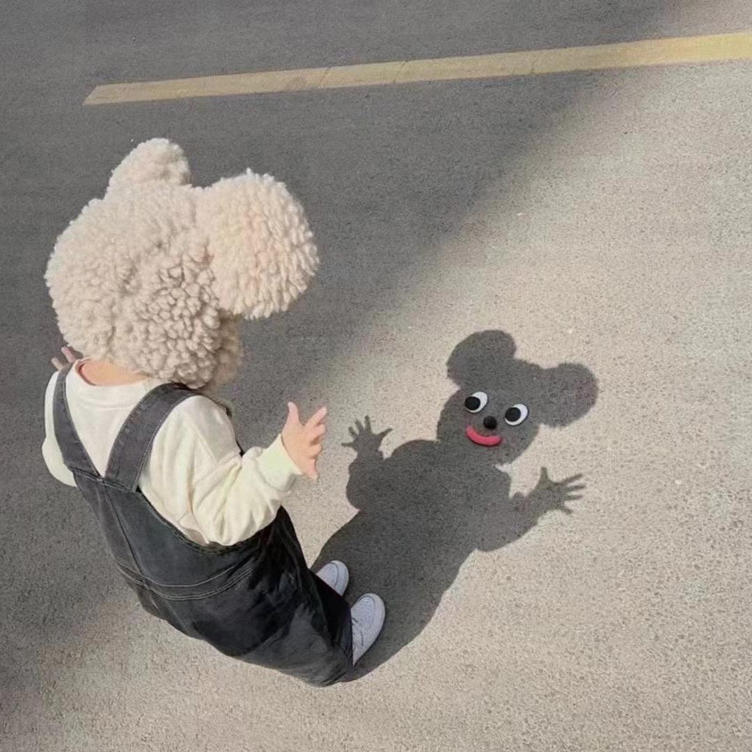 《～》
