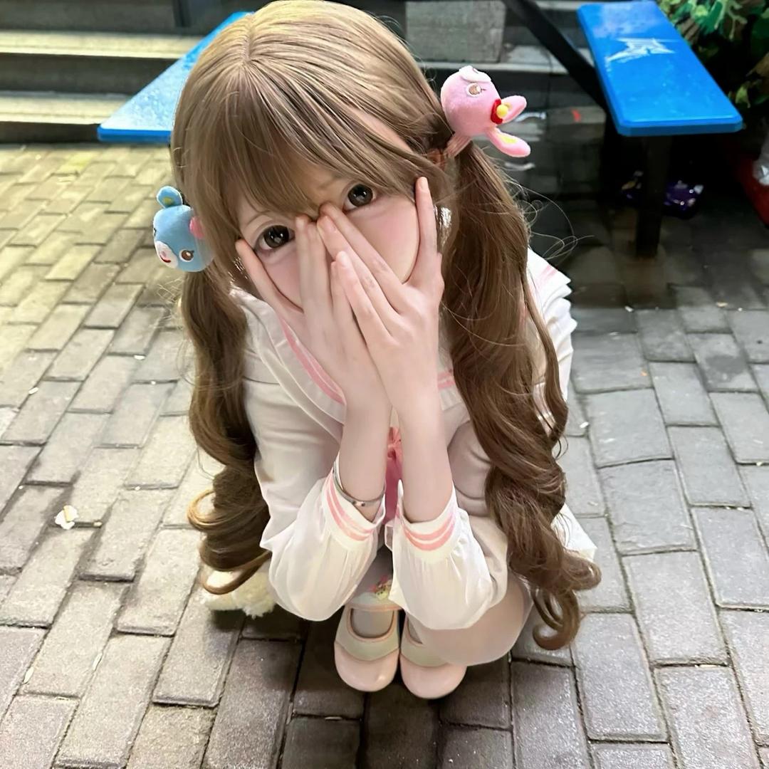 七七